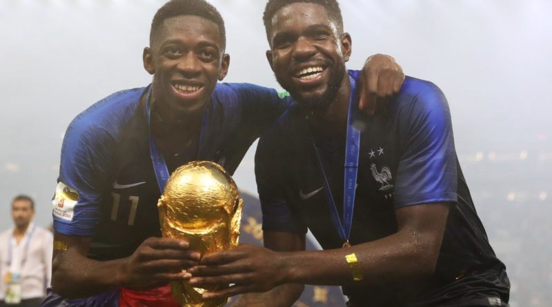 Ousmane Dembele and Umtiti of France with World Cup trophy